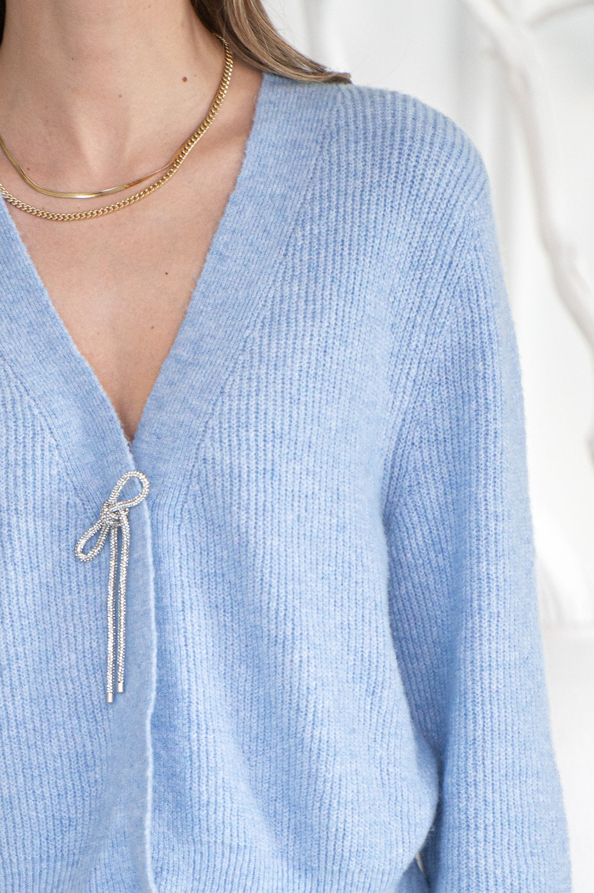 CRYSTAL BOW SWEATER-BL
