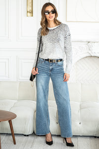 WILD ONE ANIMAL PRINT SWEATER IN BLACK