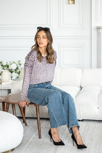 WILD ONE ANIMAL PRINT SWEATER IN PLUM