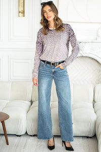 WILD ONE ANIMAL PRINT SWEATER IN PLUM