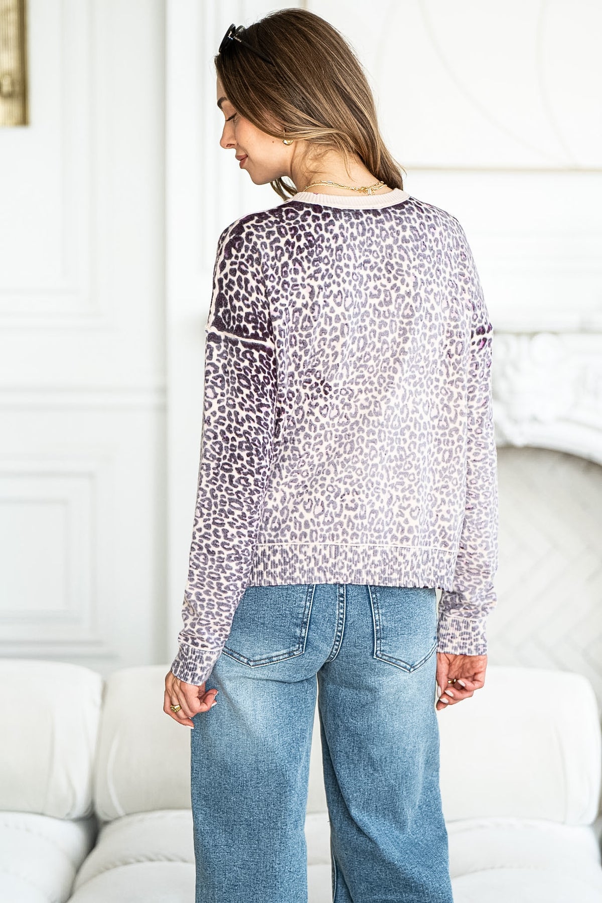 WILD ONE ANIMAL PRINT SWEATER IN PLUM