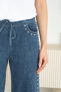 TUCKER STUDDED WIDE LEG JEANS