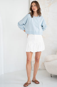 JADE BUBBLE HEM DENIM MINI SKIRT