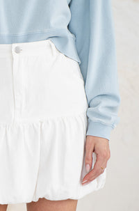 JADE BUBBLE HEM DENIM MINI SKIRT